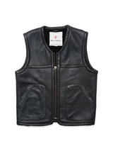 The Saga Shearling Gilet - Scarab by Blue de Gênes is a black leather sleeveless vest with a front zipper, two front pockets, and a visible white brand label inside the collar, presented flat on a white background.