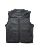The Blue de Gênes Saga Shearling Gilet - Scarab is a black leather vest photographed from the back, showcasing visible stitching and a rectangular patch near the collar against a white background.