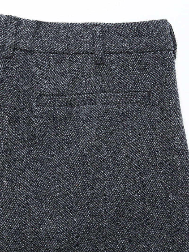 Close-up of the back pocket and waistband of the Kyoto Pant - Black Pattern by Blue de Gênes, featuring a horizontal welt pocket and belt loops—signature elements of this timeless trouser.