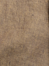 Close-up of the BGcricket Lin Blazer - Grey Mel by Blue de Gênes, highlighting the grey melange linen-hemp blend fabric with a diagonal weave, subtle color variations, and natural surface imperfections.