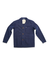 The BGkendrick Toll Jacket - Navy Stripe by Blue de Gênes features a relaxed fit, white vertical pinstripes, front buttons, three patch pockets, and long sleeves, shown laid flat on a white background.