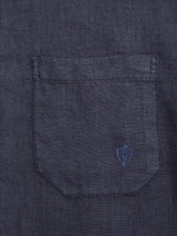 A close-up of the Blue de Gênes BGenric Hope S/S Shirt in Dark Navy, featuring a small embroidered blue shield emblem near the bottom right corner of the pocket.