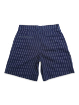 The BGcupra Toll Shorts - Navy Stripe by Blue de Gênes feature tailored navy cotton with white vertical pinstripes, two back welt pockets, and are shown flat on a white background—ideal for polished summer workwear.