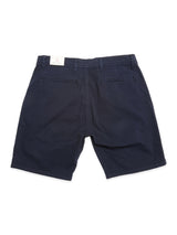 Blue de Gênes BGmenzino Vecchio Shorts in dark navy for men, shown from the back with two welt pockets and belt loops. Crafted from lightweight cotton for all-day comfort, laid flat on a white background.