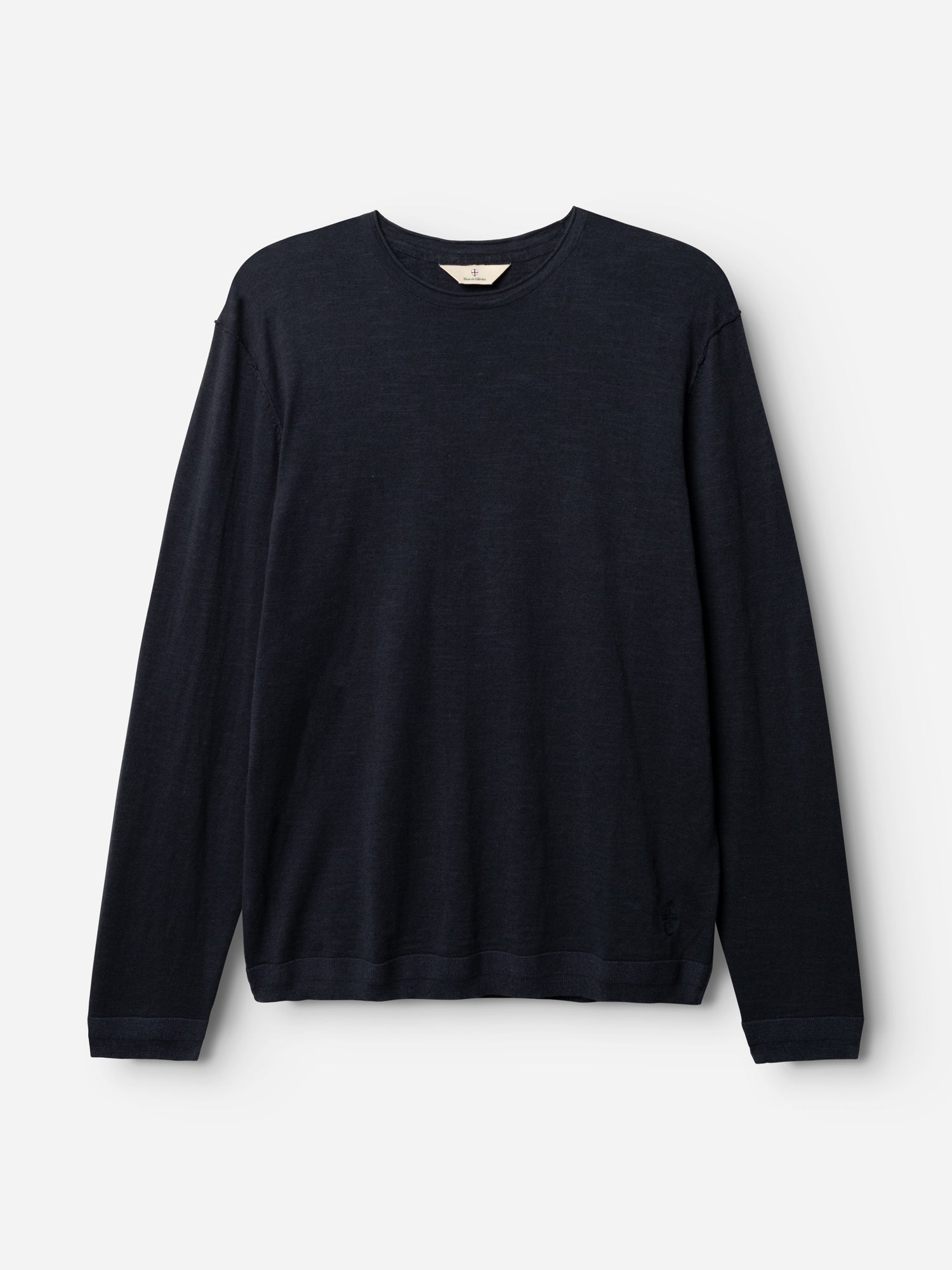 The BGmonty Knit by Blue de Gênes is a dark navy, long-sleeved crewneck jumper with a simple, classic design. Made from a soft cotton-linen blend, it is laid flat against a white background and features no visible patterns or logos.