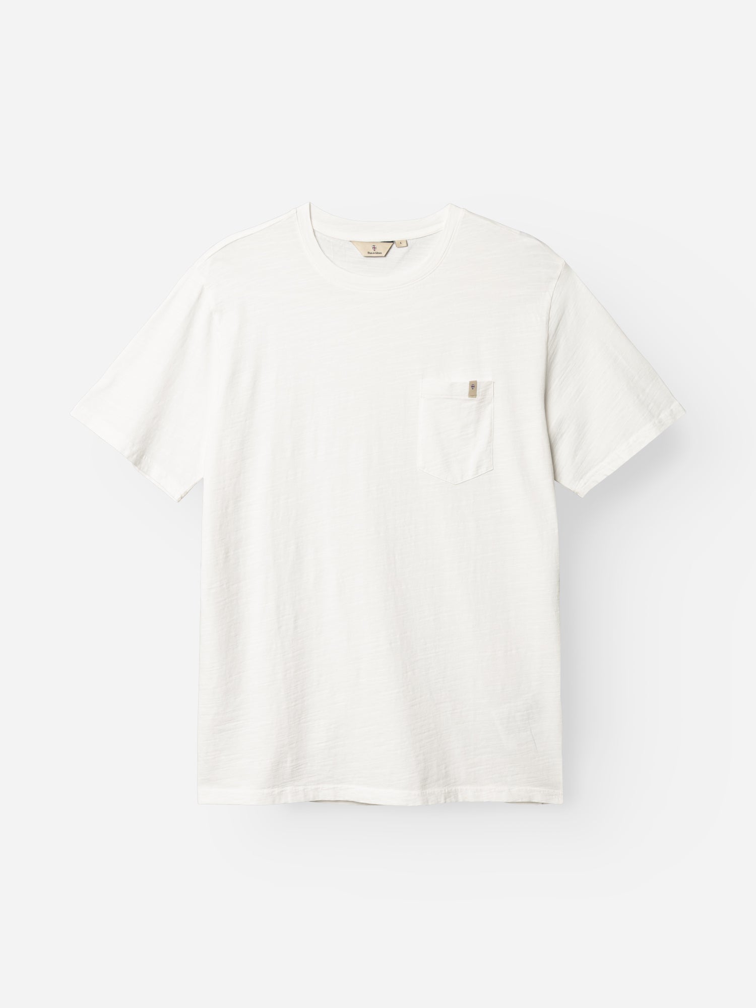 The BGoscar T-Shirt - Snow Fall by Blue de Gênes is a 100% cotton, plain white crewneck with a left chest pocket, shown against a white background.