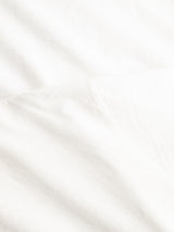 Close-up of the BGoscar T-Shirt - Snow Fall by Blue de Gênes, featuring softly textured 100% cotton fabric with gentle folds and subtle shadows for a clean, minimal look.