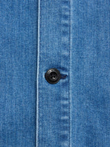 Close-up of BGpontus Denim Overshirt - Used by Blue de Gênes, featuring blue cotton blend denim, a black center button with stitched buttonhole, and visible textured weave—typical of a relaxed fit overshirt.