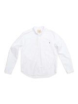 The BGsander Oxford Shirt - White by Blue de Gênes is a 100% cotton, long-sleeve shirt with a button-down collar, front chest pocket featuring an embroidered logo, shown on a plain white background.