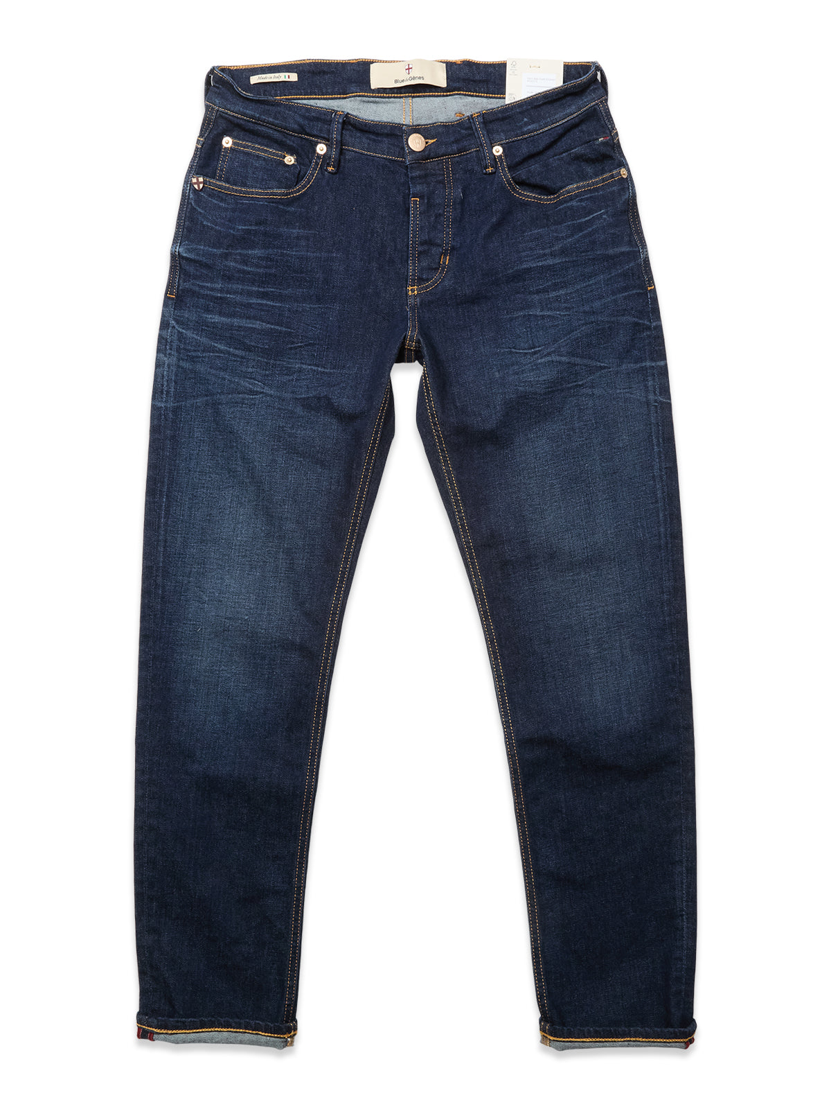 The Blue de Gênes Vinci Pala Dark V2 Jeans in dark blue denim are regular fit, comfort stretch jeans with five pockets and metal rivets, shown laid flat on a white background.