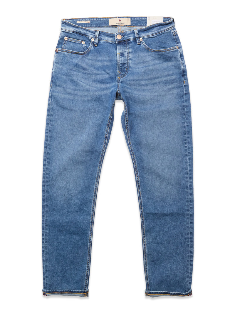The Vinci Pala Used V2 Jeans by Blue de Gênes are regular fit denim blue jeans made from comfort stretch fabric with a classic five-pocket design, button and zipper closure, and straight legs, laid flat on a white background.