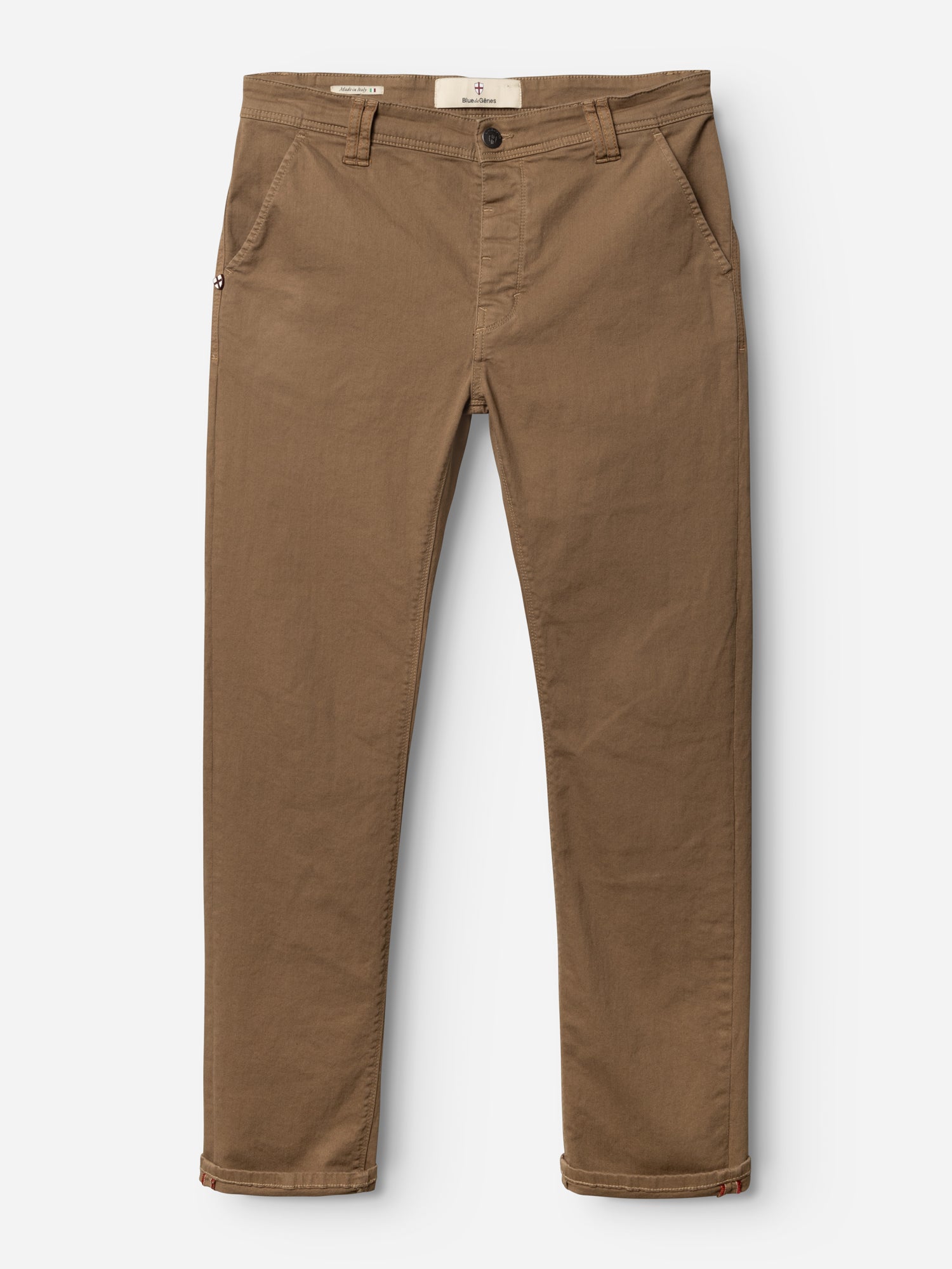 A pair of BGpaulo Pavia 1 V2 Chino - Fudge by Blue de Gênes, straight-leg cotton stretch chinos in tan brown with front pockets, button and zipper closure, and cuffed hems shown on a white background.