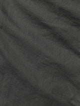 A close-up of the BGpaulo Pavia 1 V2 Chino by Blue de Gênes in charcoal shows textured, dark gray cotton stretch fabric with subtle diagonal wrinkles, evoking the look of vintage military pants.