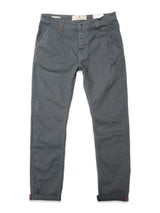 The Blue de Gênes Paulo Pavia 1 V2 Chino in Charcoal features side pockets, a button and zip fly, and rolled-up cuffs. Made from cotton stretch fabric, the pants are shown laid flat on a white background.