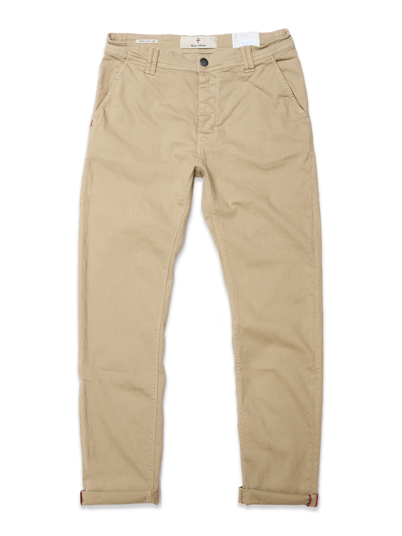 A pair of Blue de Gênes Paulo Pavia 1 V2 Chino pants in khaki cotton stretch, featuring button and zipper closure, front and back pockets, and slightly rolled-up cuffs, laid flat on a white background.