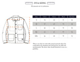 Illustration showing measurement points for the BGkendrick Toll Jacket - Navy Stripe by Blue de Gênes, plus a size chart (cm) for chest, sleeve, back, and shoulder—ideal for comparing with your favorite relaxed fit or worker jacket. Sizes: S–XXL.