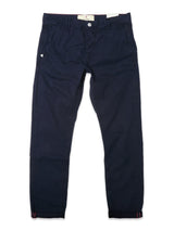 A pair of Blue de Gênes BGpaulo Teo Pant in dark navy, featuring front pockets and a button closure, displayed flat on a white background.