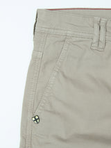 Close-up of the upper section of Blue de Gênes BGpaulo Teo Pant in Shadow Green, featuring a belt loop, side pocket, and a diamond-shaped metal accent near the pocket—highlighting the refined durability of these pants.