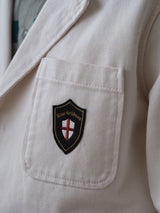 A close-up of the pocket on the BGbaio Twill Blazer - Chalk by Blue de Gênes, crafted from soft cotton twill.