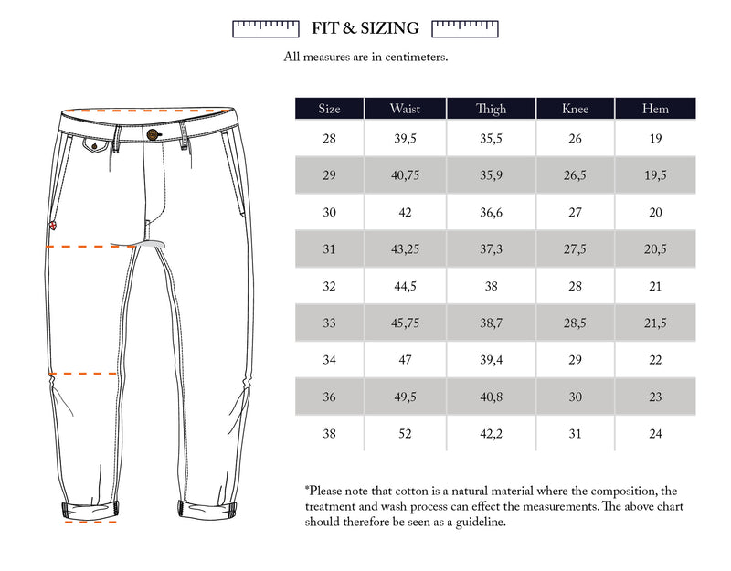 Illustration of Etsu Cord Chino - Navy by Blue de Gênes, labeled at waist, thigh, knee, and hem. Sizing chart (28–38 cm) included with note on cotton variation. Relaxed regular fit ensures comfortable wear.