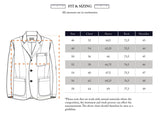 A sizing chart for the Blue de Gênes BGgabbiano Rory Blazer - Army includes an illustration highlighting measurement points. The chart displays sizes 46–58 with chest, sleeve, back, and shoulder measurements in centimeters. A note mentions that natural variations are typical of herringbone fabric and the blazer’s unconstructed design.