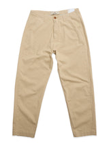 The Blue de Gênes BGpalco Rodas Pants in pale khaki, crafted from a cotton-hemp blend, feature front pockets, a button closure, and belt loops. Shown laid flat on a white background.