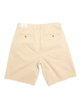 Back view of Blue de Gênes BGcopple Rodas Shorts in Pale Khaki, featuring belt loops, two back welt pockets with button closures, a small white waistband label, and a comfortable, durable cotton-hemp blend fabric.