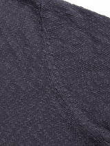 Close-up of the BGjohn Slubby Polo in Dark Navy by Blue de Gênes, highlighting the textured slubby cotton knit and stitching details.