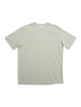 The Blue de Gênes BGoscar T-Shirt in Shadow Green, made from 100% cotton with a crewneck and small left chest pocket, is shown laid flat on a white background.