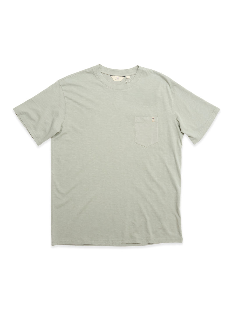 The Blue de Gênes BGoscar T-Shirt in Shadow Green, made from 100% cotton with a crewneck and small left chest pocket, is shown laid flat on a white background.