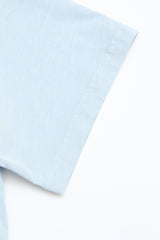 Close-up of the Blue de Gênes BGoscar T-Shirt in Blue Fog, made from 100% cotton, displayed flat on a white surface, highlighting the crewneck, sleeve, and shoulder seam.