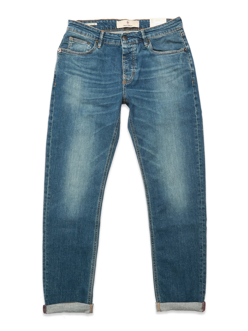 The Vinci Topaz Vintage Jeans - Used by Blue de Gênes are blue comfort stretch denim jeans with a faded wash, five pockets, and rolled-up cuffs, shown laid flat on a white background.